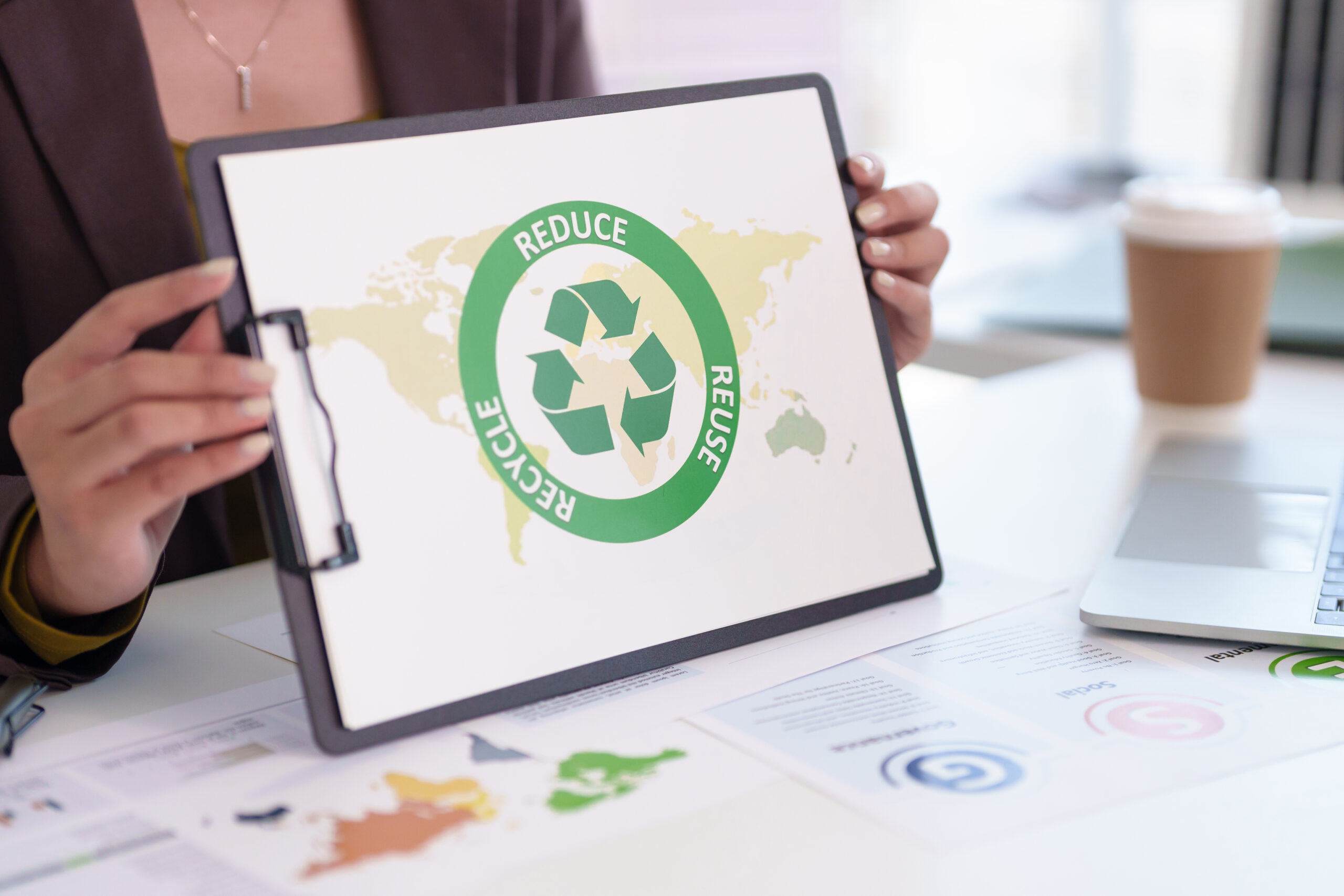 Adult professional hands present environmental sustainability co