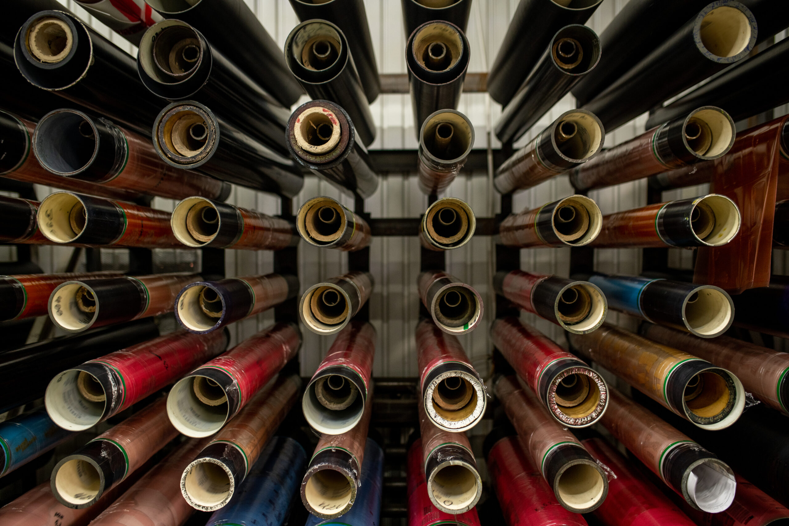 Equipment for newly made polyetylene film to roll on hanging on bars
